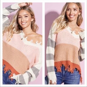 Distressed V-neck sweater